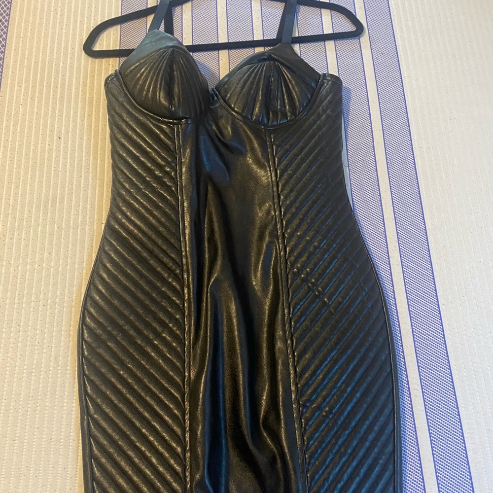 Sexy fitted black dress; minimal stretch.